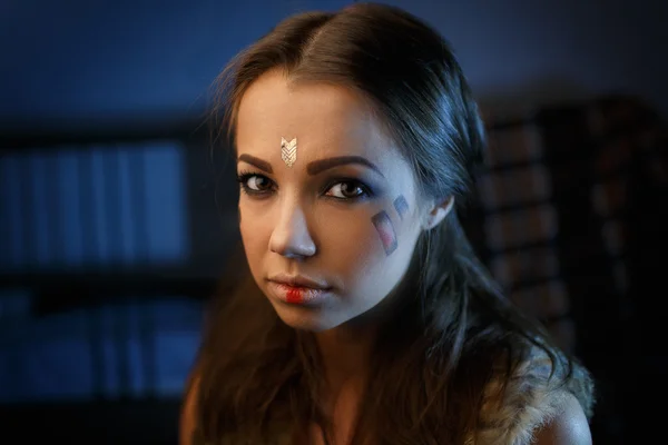 Portrait of a beautiful girl in the style of Indian America — Stock Photo, Image