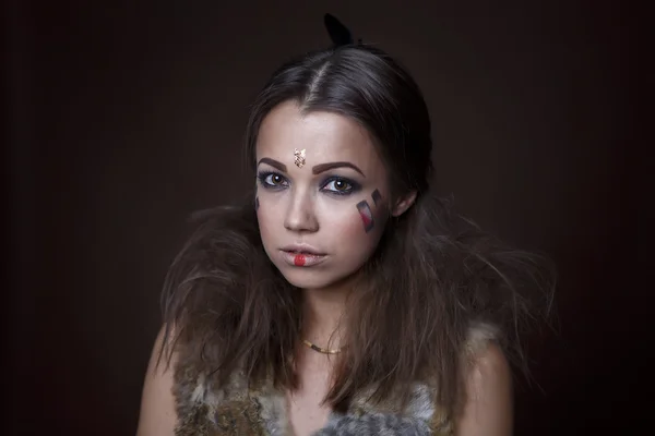 Portrait of a beautiful girl in the style of Indian America — Stock Photo, Image