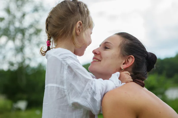 Mom and daughter are bathing in river — Stock Photo, Image