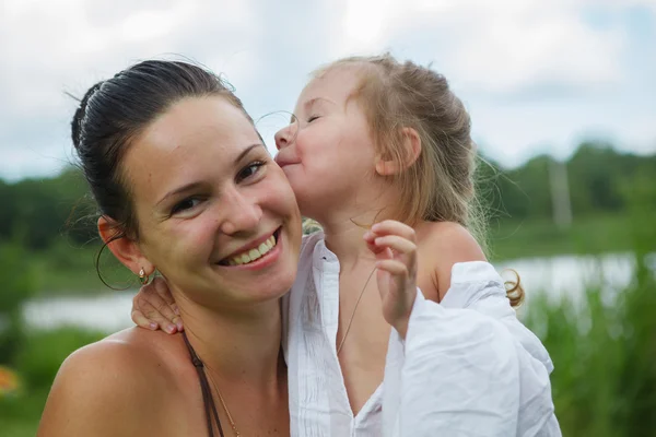 Mom and daughter are bathing in river — Stock Photo, Image