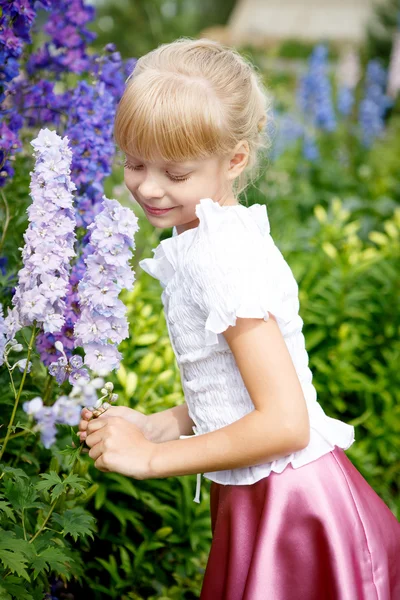 Portrait of beautiful little girl in white dress — Stock Photo, Image