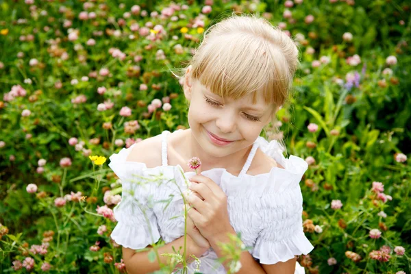 Portrait of beautiful little girl in white dress — Stok Foto
