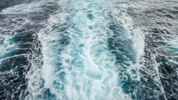Waves left behind of a cruise ship in the ocean — Stock Video