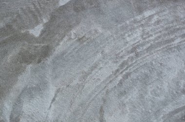 Gri arkaplanı olan beton duvar