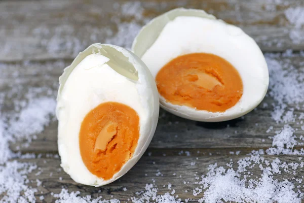 Salted egg on rice porridge — Stock Photo, Image