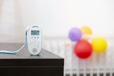 wireless baby monitor device on the table clipart