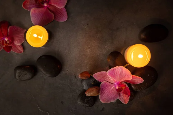 Orchid Flowers Spa Stones Candles Dark Rock Background Beauty Treatment — Stock Photo, Image