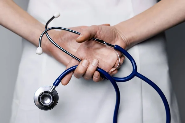 Female Doctor Holds Stethoscope Hands Back — Foto Stock
