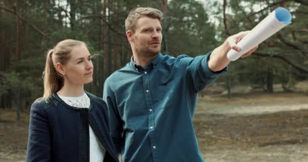 Young Couple Looking Choosing Plot Land House Construction — Stock Video