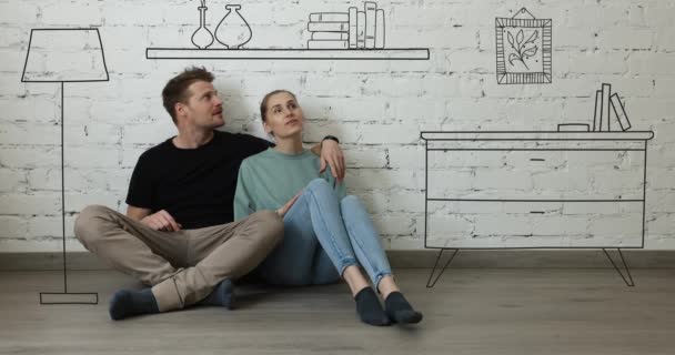 Couple Heureux Assis Sur Sol Dans Une Nouvelle Maison Planification — Video