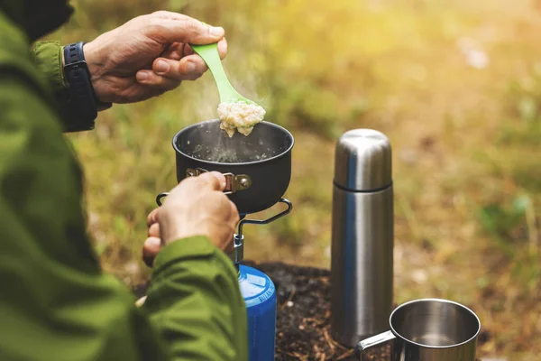 Preparing Oatmeal Porridge Outdoors Gas Burner Camping Cooking Equipment — Stock Photo, Image