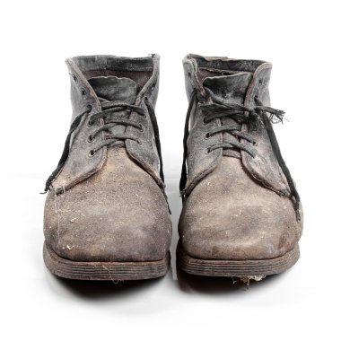 old dirty boots isolated on white background clipart