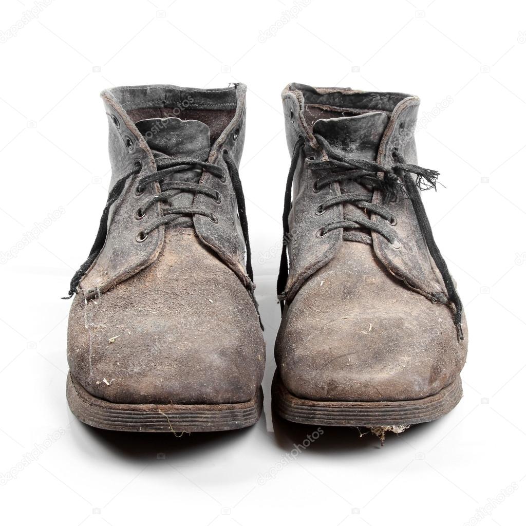 old dirty boots isolated on white background