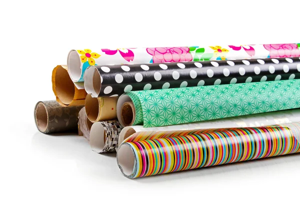 Rolls of colorful wrapping paper isolated on white — Stock Photo, Image