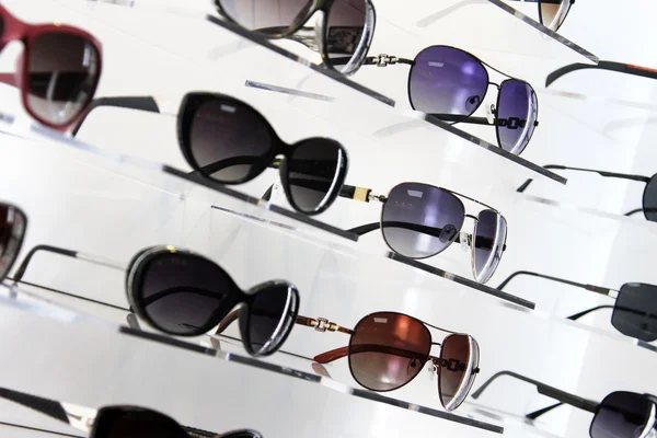 Shop shelves with sunglasses — Stock Photo, Image