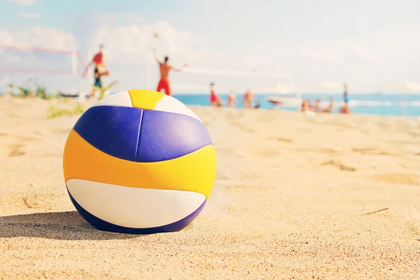 Beach volleyball ball in sands — Stock Photo, Image