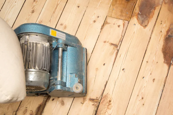 Old plank floor and grinding machine with copy space — Stock Photo, Image