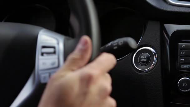 Turn on the car engine with start button — Stock Video