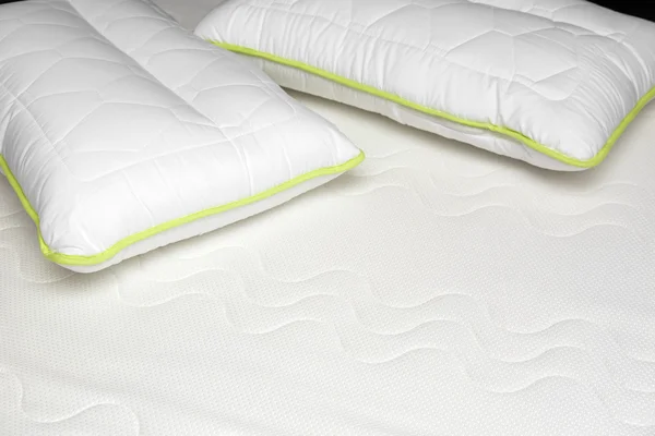 Closeup of orthopedic mattress and pillows — Stock Photo, Image