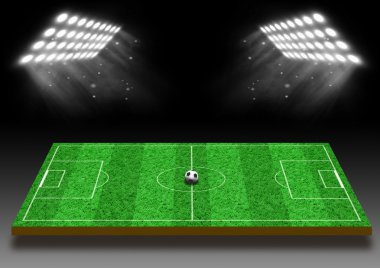 Işıklar altında bir çim futbol sahası