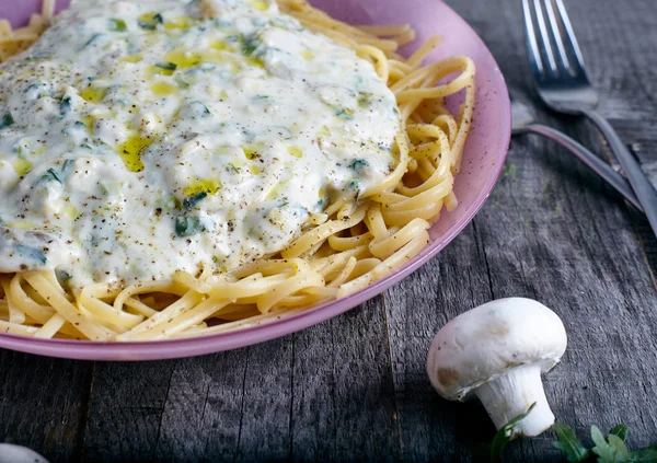 Pasta with cream mushroom sauce — Stock Photo, Image