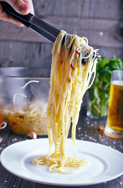 Pasta spaghetti with garlic and chili — Stock Photo, Image