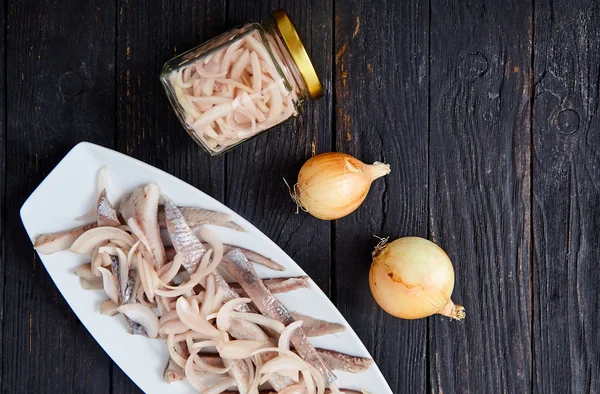 Herring fillets with pickled onion