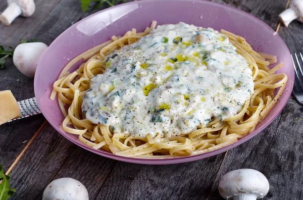 Pasta with cream mushroom sauce — Stock Photo, Image