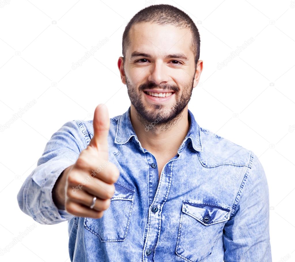Handsome casual man thumbs up