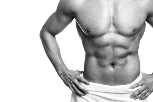 Muscled young man posing in towel — Stock Image Muscled young man posing in towel Stock Picture
