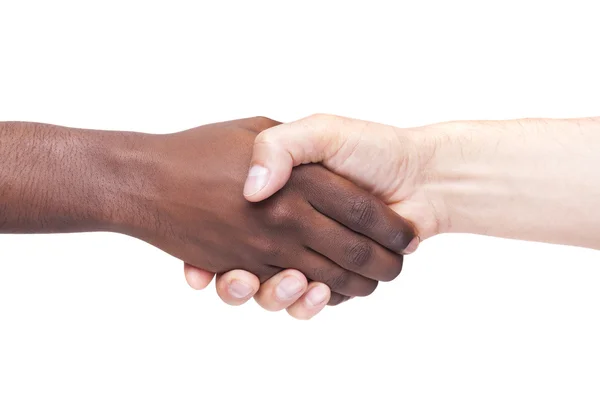 Afrikanska mannens hand skakar vit mans hand — Stockfoto