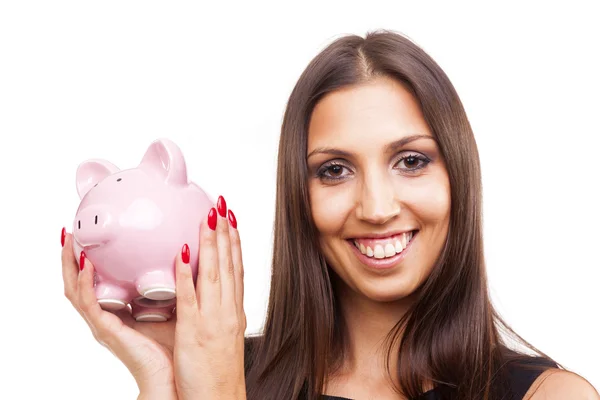 Sorrindo mulher segurando um banco porquinho — Fotografia de Stock