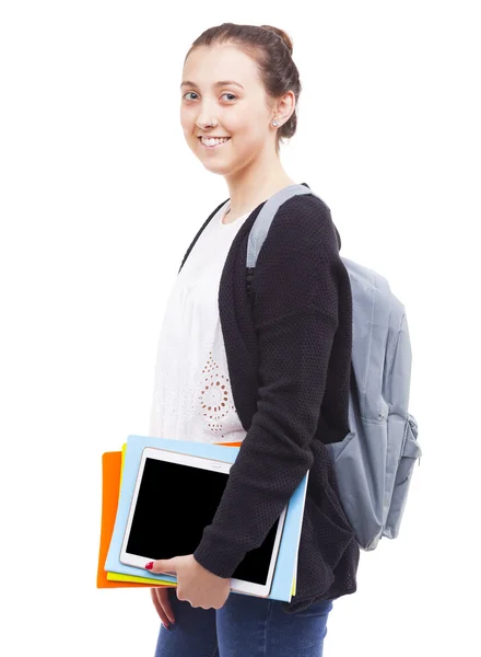 Estudante menina segurando cadernos e um tablet — Fotografia de Stock