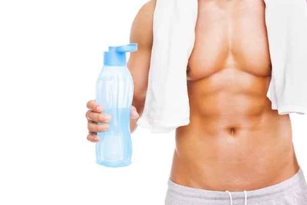 Fit man holding a bottle of water — Stock Photo, Image