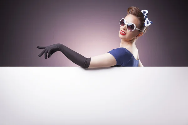 Pin Up girl holding a white board — Stock Photo, Image