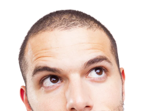 Halbgesicht eines jungen Mannes, der nach oben schaut — Stockfoto