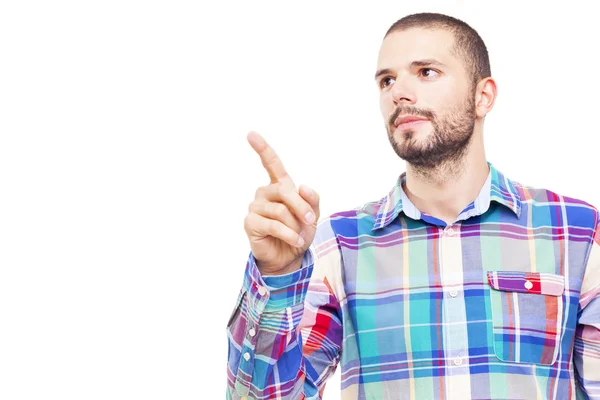 Casual man pointing at copy space — Stock Photo, Image