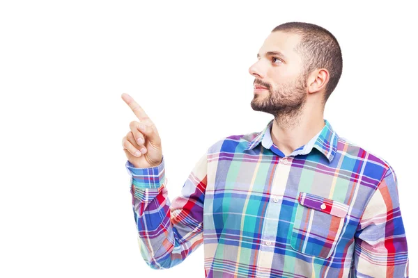 Casual man pointing at copy space — Stock Photo, Image