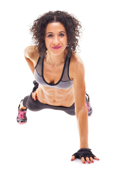 Fit mujer haciendo flexiones — Foto de Stock