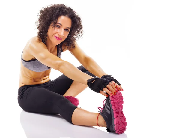 Ajuste mujer estiramiento piernas — Foto de Stock