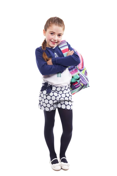 Diák kislány, hordozó hátizsák — Stock Fotó