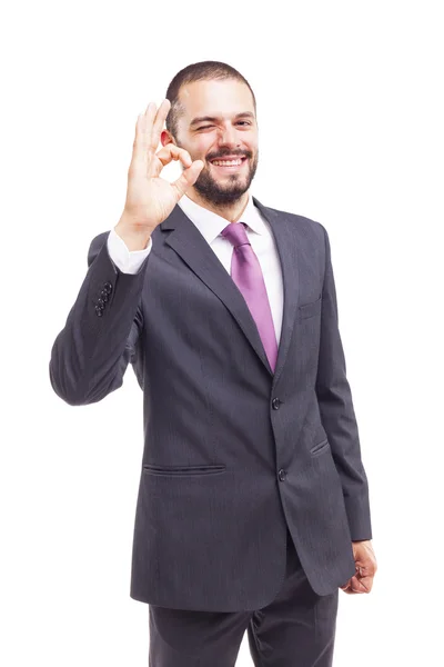 Young businessman showing Ok sign — Stock Photo, Image