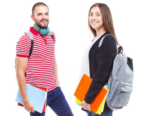 Glada studenter stående leende — Stockfoto