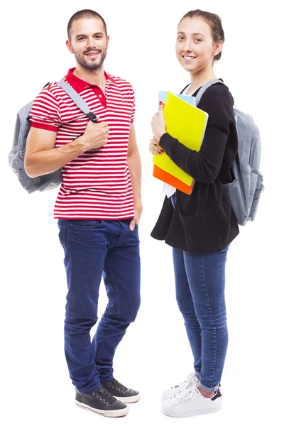 Студенты с рюкзаком и ноутбуками — стоковое фото