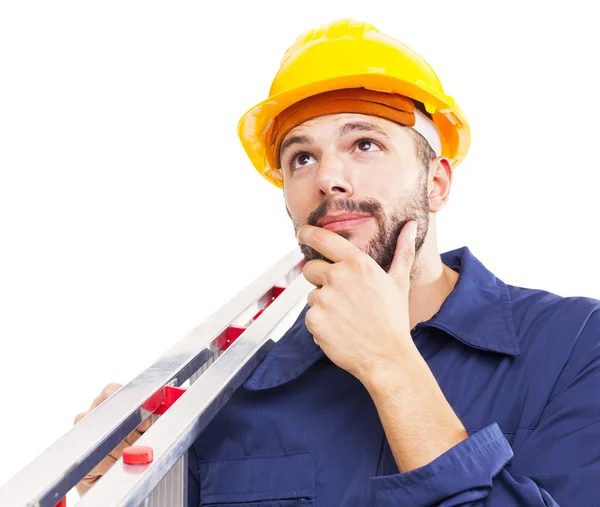 Thoughtful worker holding a aluminum stepladder — Stock Photo, Image