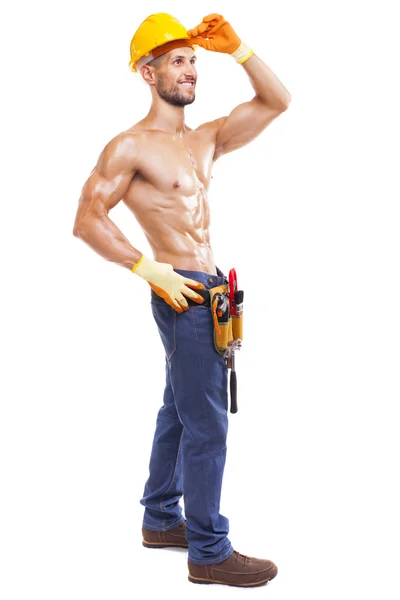 Full length of a muscular young worker — Stock Photo, Image