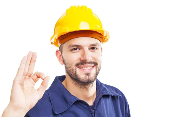 Trabalhador sorrindo gesto ok sinal — Fotografia de Stock