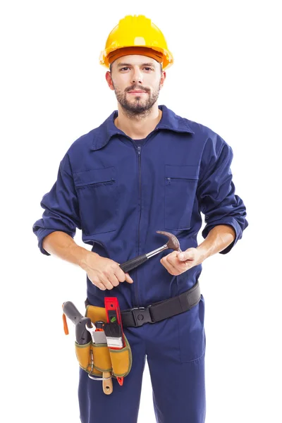 Mladý pracovník drží velké kladivo — Stock fotografie