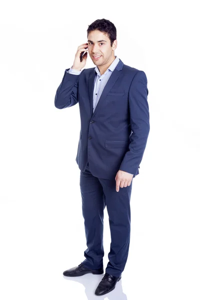 Full body portrait of a businessman on the phone, isolated on wh — Stock Photo, Image