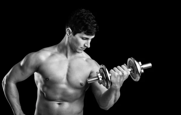 Fitness man lifting weights on black background Stock Picture